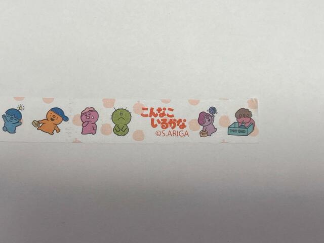 ホワイト×オレンジのドットにこんなこいるかなの仲間たちのイラスト柄