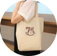 「ペコちゃん75周年 HAPPY BAG」＜価格：3,900円（税込）＞ 【歴代ペコちゃんがデザインされた限定缶も登場♪不二家「ペコちゃん75周年記念商品」発売！WEBストアで予約受付中！】