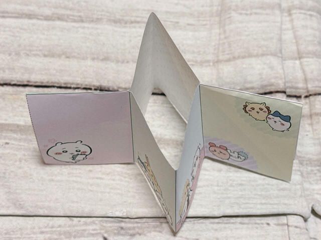 カットした部分を開き、十時型になるように折ります