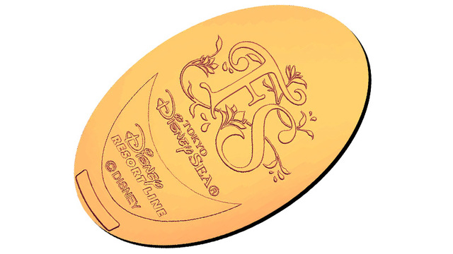 「ファンタジースプリングス」のロゴが描かれたスーベニアメダル