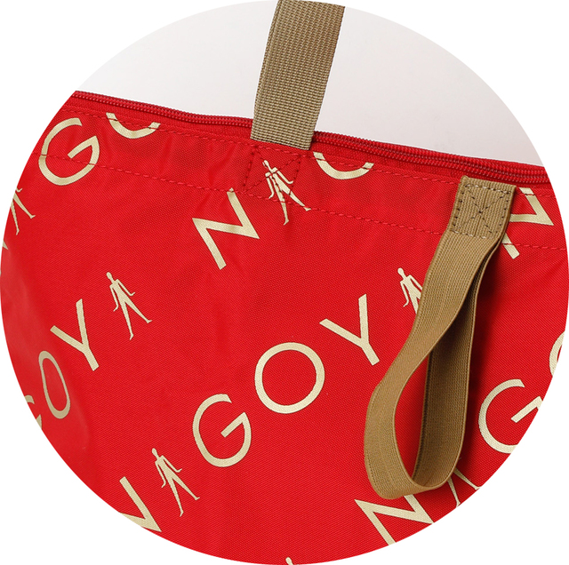 表は紀ノ国屋のロゴ、裏は「NAGOYA」の文字が。よ〜く見るとナナちゃんのシルエットが！