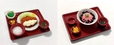 「C.たっぷりタルタルソースのチキン南蛮定食／D.ねぎトロ丼」＜サイズ：横幅：約5cm、高さ:約1cm～2,6cm（トレー含む）＞【ジョイフルのメニューが“超リアルなミニチュア”に変身！3月18日より全国のジョイフルで順次発売！】