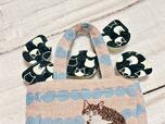 【カルディ ネコミニトートバッグ】フタに描かれたネコの模様もかわいく、お菓子までしっかり楽しめます
