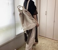 【UNIQLO U　ドローストリングバックパック】生成りのような風合いでコーデの邪魔をしません
