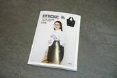新製品を紹介したリーフレット付き【moz（モズ）SHOPPING BAG BOOK SPRING EDITION BLACK】2,189円（税込）