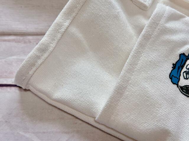素材は綿、ポリエステル。しっかりしたコットンキャンバス調の生地
