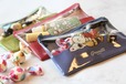 【ファミリーマート×PEANUTS】《キャンペーン第1弾「フラットポーチ」》ポーチ5種類のうち、3種類は中身が見える仕様。何が入っているかわかりやすいのもうれしい
