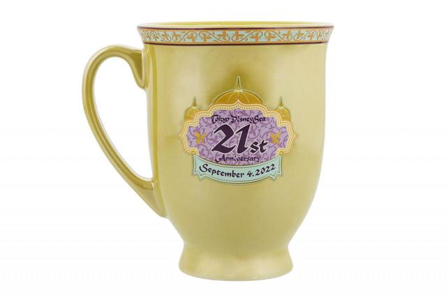 マグカップ 1,500円｜サイズ：直径約9×高さ約12cm｜東京ディズニーシー開園21周年をお祝いするグッズ｜発売日：2022年9月4日（日）｜販売店舗：エンポーリオ