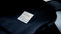 【DEAN ＆ DELUCA】20周年のタグをあしらった内ポケット付き