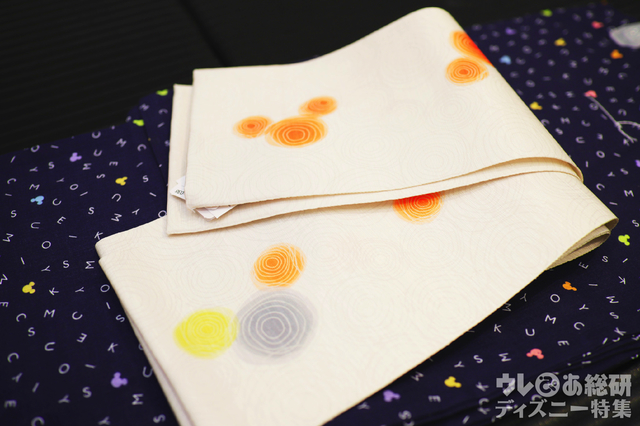 どんな年代でも合わせやすくさりげないミッキーが可愛らしい帯デザイン