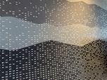 壁面には草津の湯けむりや山並みなどをイメージしたシルクアート