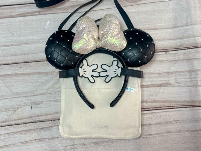 バッグと手のモチーフに物が挟めます