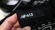 【ニューバランス　ランニングシューズ W413】ベロの部分に施されたモデルナンバーも印象的！