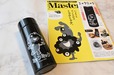 【『MonoMaster 2026年11月号』（宝島社）】「黒ミャクミャク」がインパクト抜群の、持ち運びに便利なボトルが付録に！