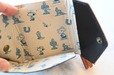 【『SNOOPY YEAR OF THE HORSE MINI WALLET BOOK BROWN』（宝島社）】内生地はウエスタンスタイルに身を包んだスヌーピーとチャーリー・ブラウンの総柄