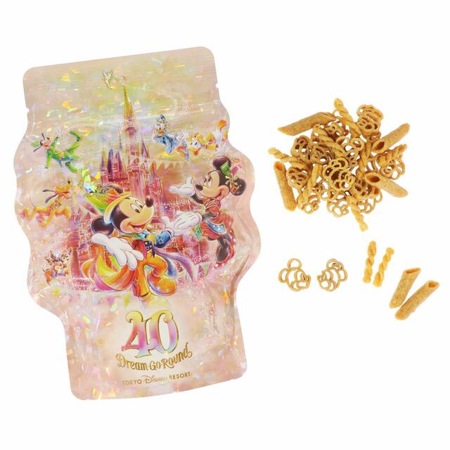 パスタスナック 700円｜内容量：90g（スモークターキーレッグ風味）｜東京ディズニーリゾート40周年“ドリームゴーラウンド”スペシャルグッズ｜発売日：2023年4月10日（月）｜販売店舗：東京ディズニーランド「グランドエンポーリアム」、東京ディズニーシー「ヴァレンティナーズ･スウィート」