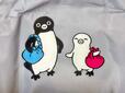 フロントには、Suicaのペンギンと子ペンギンのアートプリント入り