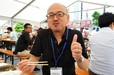激辛グルメ祭り／残った1つを安心してほおばるライター矢口 