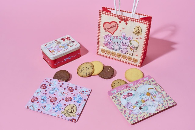 【ステラおばさんのクッキー×SWIMMER】SWIMMERのキャラクターがステラおばさんのクッキーを持ったコラボ限定イラストのデザイン