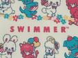 前面には大きく「SWIMMER」のロゴ入り