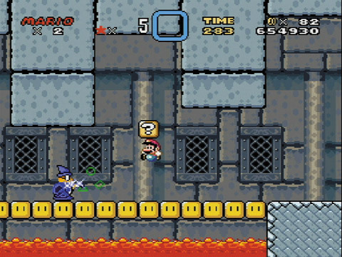 スーパーマリオワールド／ケープに分厚い眼鏡、杖を持った魔法使い「カメック」。魔法を使って攻撃してくる強敵だ。