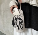 【ROOTOTE「ネコリョーシカ」】トートバッグには小物の収納に便利なルーポケットが付いています