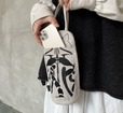 【ROOTOTE「ネコリョーシカ」】トートバッグには小物の収納に便利なルーポケットが付いています