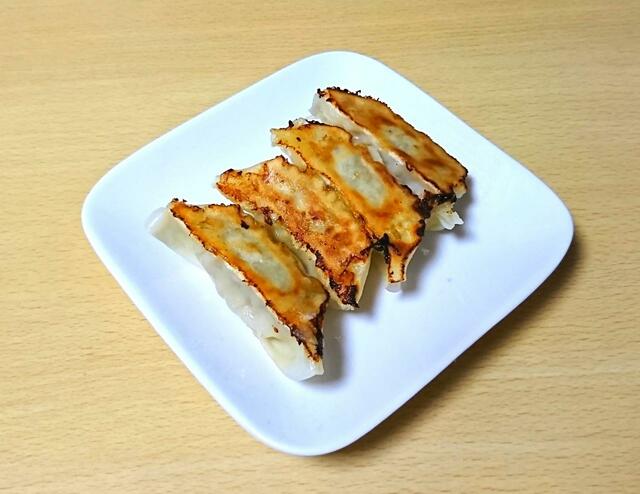 【餃子計画　冷凍黒豚餃子　1kg（50個）　899円】豚肉の甘みが感じられる上品な味わい