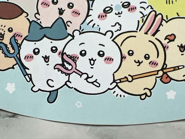 討伐棒をそれぞれ持っているちいかわ、ハチワレ、うさぎの3人