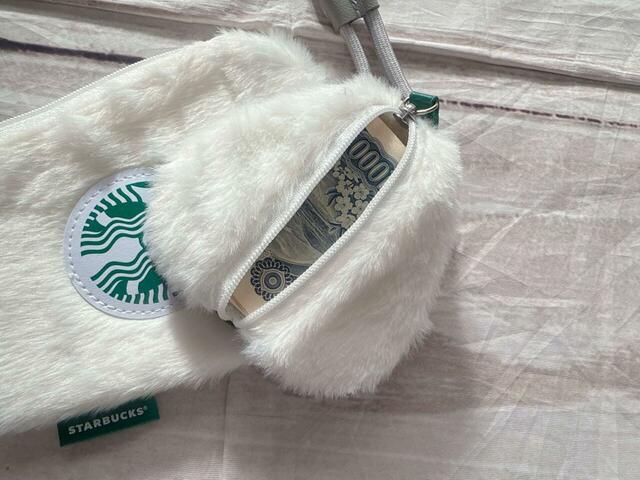 紙幣は三つ折りにすれば収納可能！