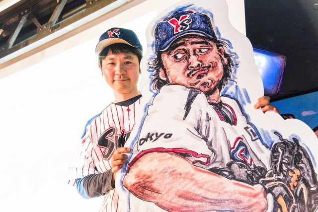 『プロ野球画報』イベント／石井一久のイラストを拡大したパネルと、ながさわ