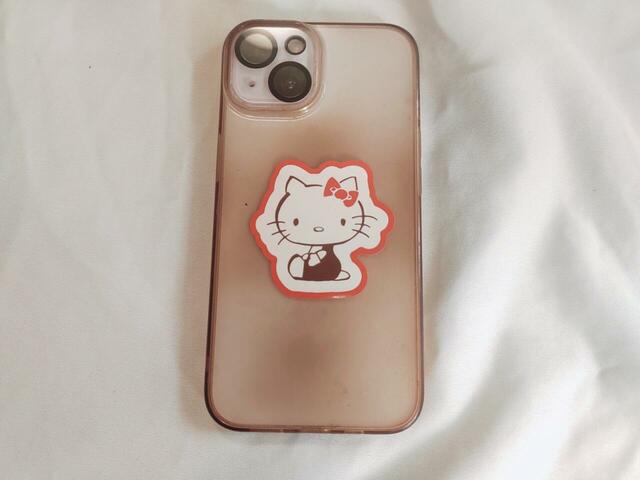 【ハローキティのステッカー台紙】携帯のボディに貼ってみました♪