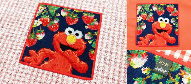 【フェイラー×セサミストリート】たくさんのジューシーなイチゴに囲まれて、ウキウキなエルモが描かれた一枚