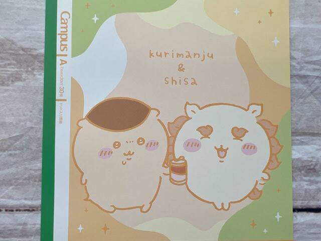 シーサーにお酒の資格の勉強を教えてくれるくりまんじゅう。応援したくなるコンビですね♪