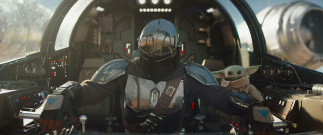 (L-R) Mandalorian (Pedro Pascal) and Grogu in Lucasfilm's THE MANDALORIAN & GROGU. Photo courtesy of Lucasfilm. © 2025 Lucasfilm Ltd™. All Rights Reserved.
