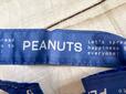 持ち手には「PEANUTS」などのロゴプリント入り
