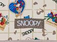 フロントには「SNOOPY」の織りタグ付き
