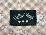 ブラックの「Hello Kitty」の織りタグ付き