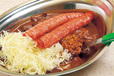 カレーのチャンピオン 麹町店（麹町）　ウインナーカレー 690円　縦半分にカットされた大ぶりのウインナーはプリプリの食感で、カレーにもよく合う。
