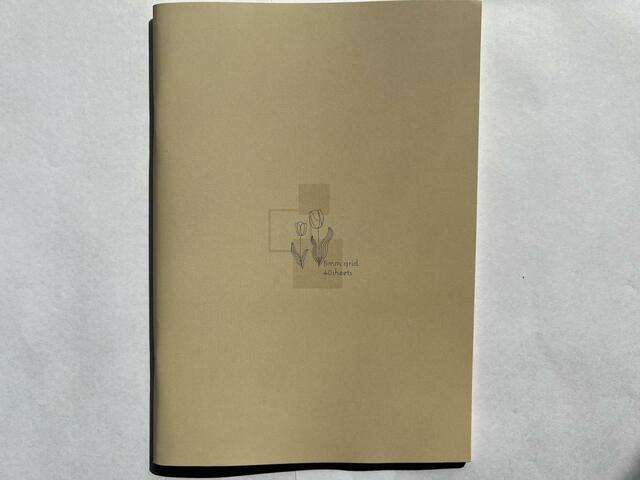 【ダイソー カラーノートA5サイズ 5mm方眼罫 40枚 イエロー】イエローの表紙はチューリップ