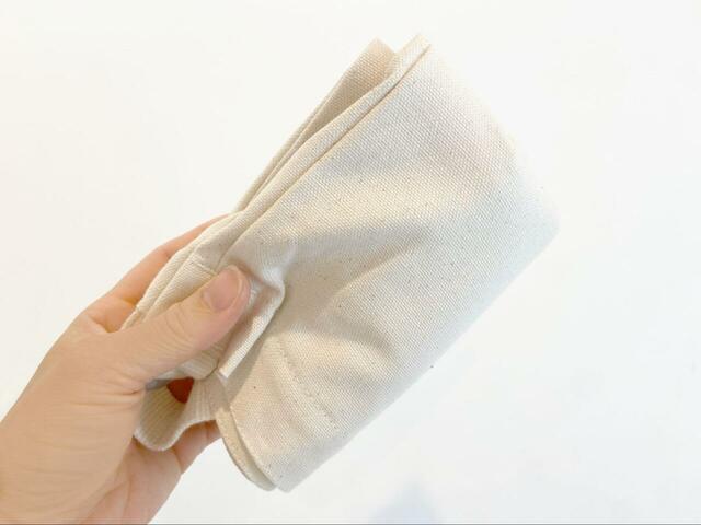 【THE NORTH FACE オーガニックコットンミュゼット】コンパクトに折り畳めるので、旅行やレジャー時のサブバッグにも便利♪