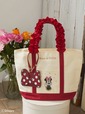 【Minnie Mouse】フリルトートプチバッグ（￥6,300）／パスケース （￥4,200）　すべて税込