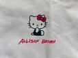 中央にはキティちゃんのイラストとアリソンブラウンのロゴ入り