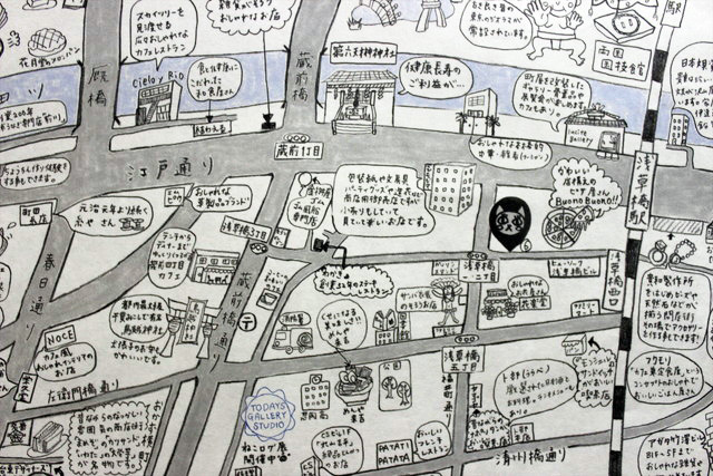 ネコカフェマップ拡大。裏がツルツルで丈夫そうな紙なので、持ち歩きにもピッタリ