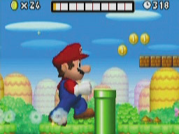 New スーパーマリオブラザーズ／巨大キノコでマリオが巨大化。このときは無敵状態に近く、敵やブロックを壊しながら進める。