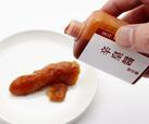 辛そうな明太子に、さらに「追い辛」として辛皇醤をかけます