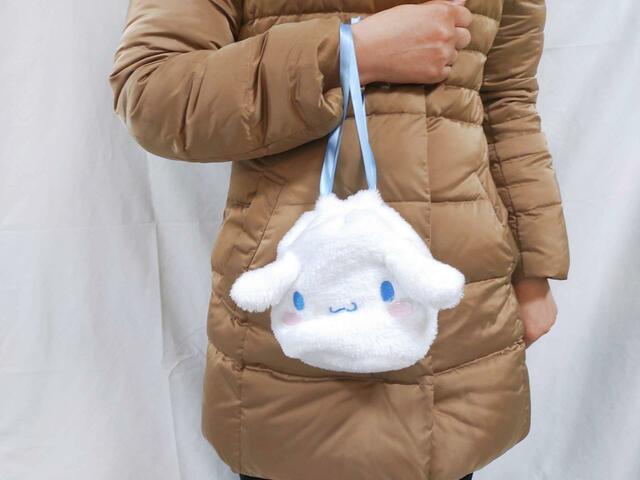 紐部分に、腕を通せる