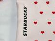 「STARBUCKS」のロゴプリント入り
