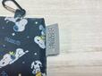 ポーチには「PEANUTS」の織りタグ付き