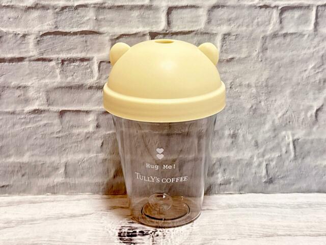 背面には「Hug Me!」と「TULLY'S COFFEE」のロゴプリント入り
